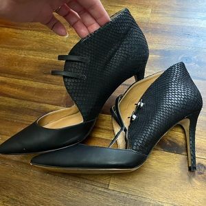 Beautiful black leather Nine West heels with high sides and double buckle